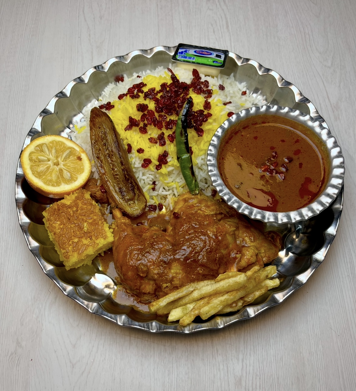 زرشک پلو با مرغ سس پز 